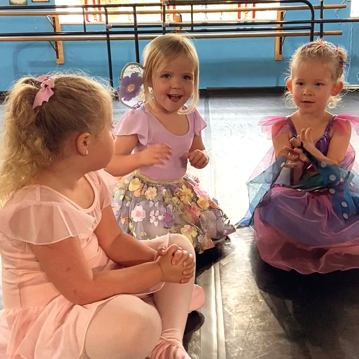 Young dancers sharing a happy moment at 3M Dance Works